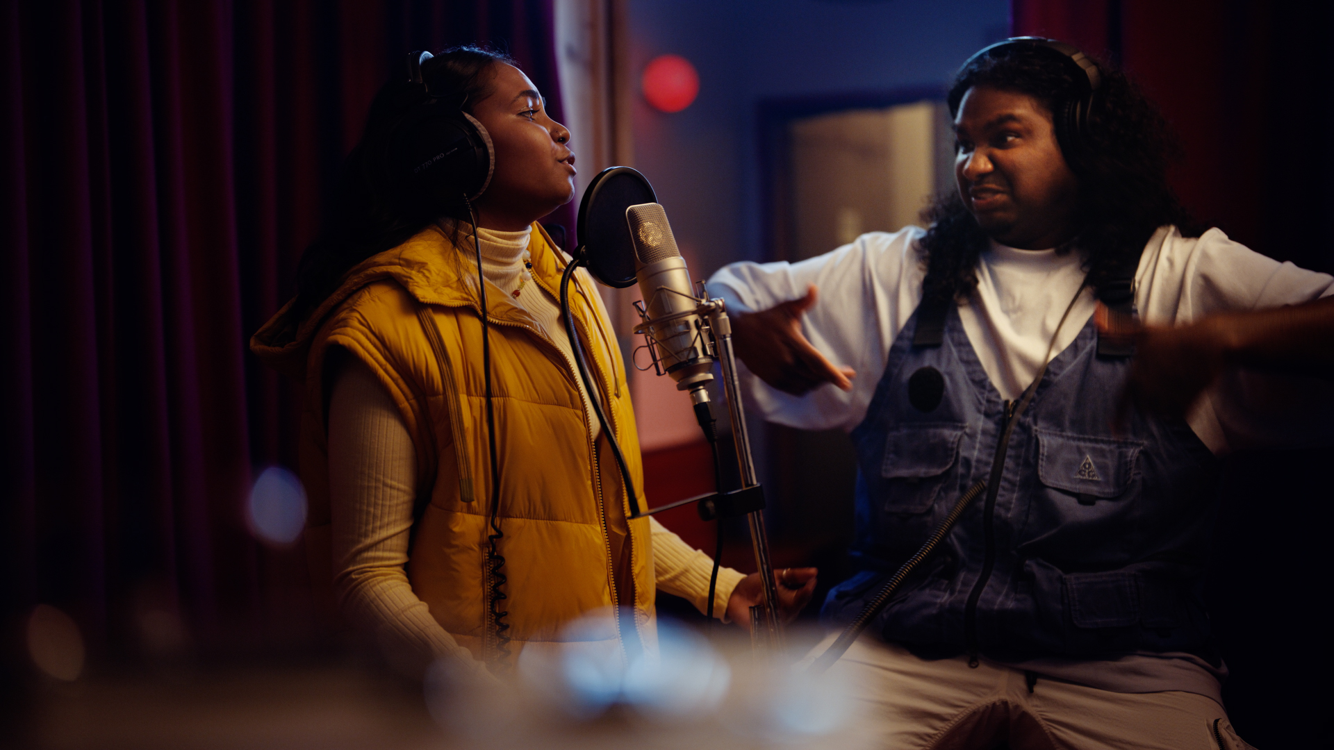 Still from google Helpfulness campaign TVC featuring Baker Boy mentoring a young woman