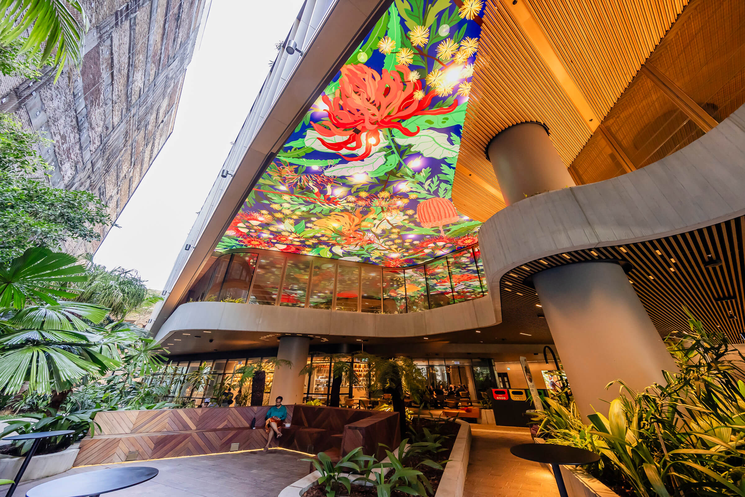 Christmas digital art display created by VANDAL for Heritage Lanes featuring animated Australian florals