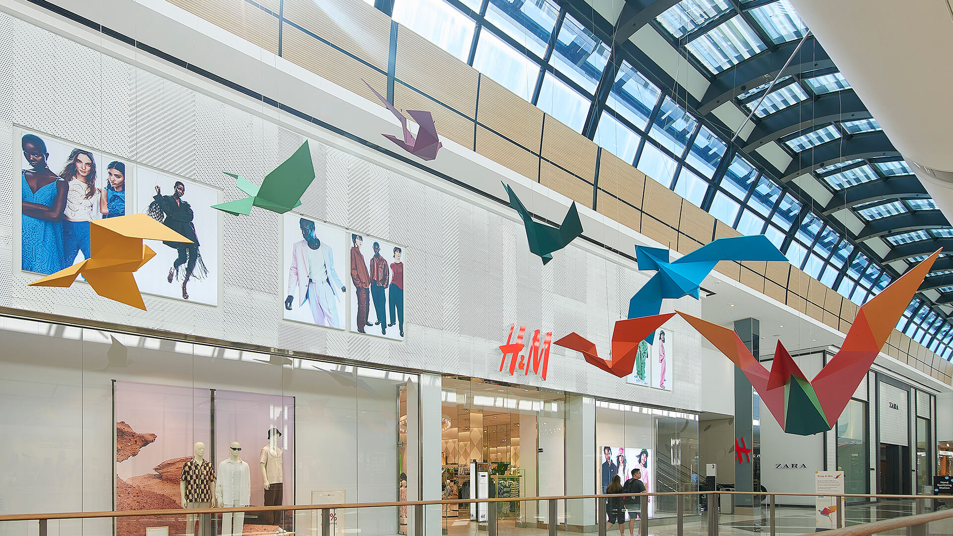 a VANDAL experiential brand activation featuring giant origami birds suspended from the ceiling of Macquarie Center